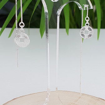 Oorbellen met een chinees geluksmuntje