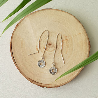 Oorbellen met een chinees geluksmuntje