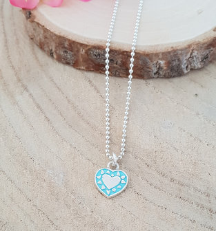 Zilveren ketting met een turquoise/zilver hartje