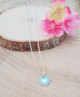 Zilveren ketting met een turquoise/zilver hartje