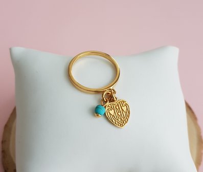 Vergulde ring met hart en turquoise kraal