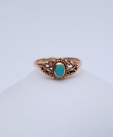 Vergulde ring met klein turquoise steentje