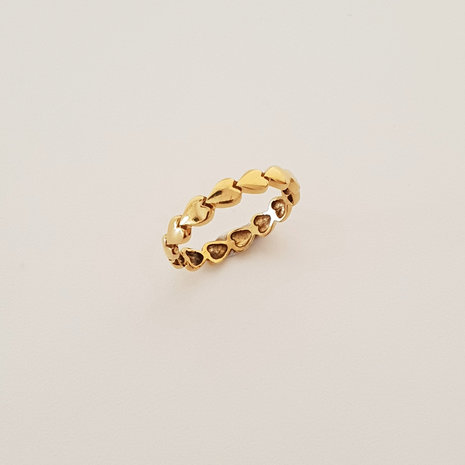 Golden ring with heart